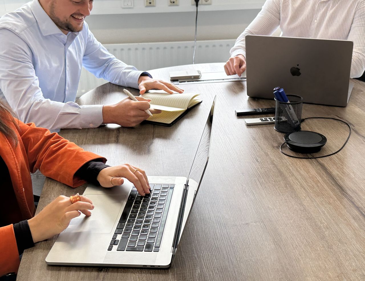 CloudBilling colleagues working through a billing setup at the table